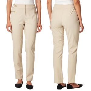 Tan Calvin Klein pants with gold zipper accents